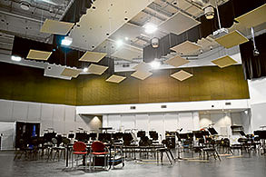 An orchestra and an office building